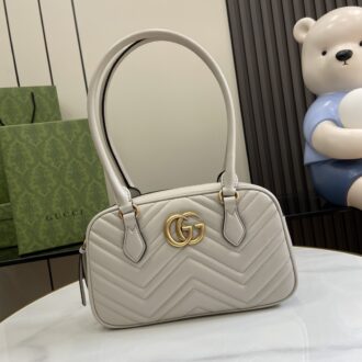 Gucci GG MARMONT medium handbag. Weight: Approx. 15.8 oz. Model:795199. Dimensions: 25.5W x 15.5H x 6.5cmD. Color: Light Grey/Original Leather.