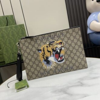 Gucci clutch with decorative strap Model number:473904. Size:30.5✖️21✖️1.5cm. Color: brown/tiger head pvc