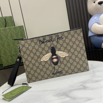 Gucci clutch with decorative strap Model number:473904. Size:30.5✖️21✖️1.5cm. Color: Brown/Bee PVC.