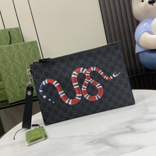 Gucci clutch with decorative strap Model number:473904. Size:30.5✖️21✖️1.5cm. Color: Black/Snake PVC.