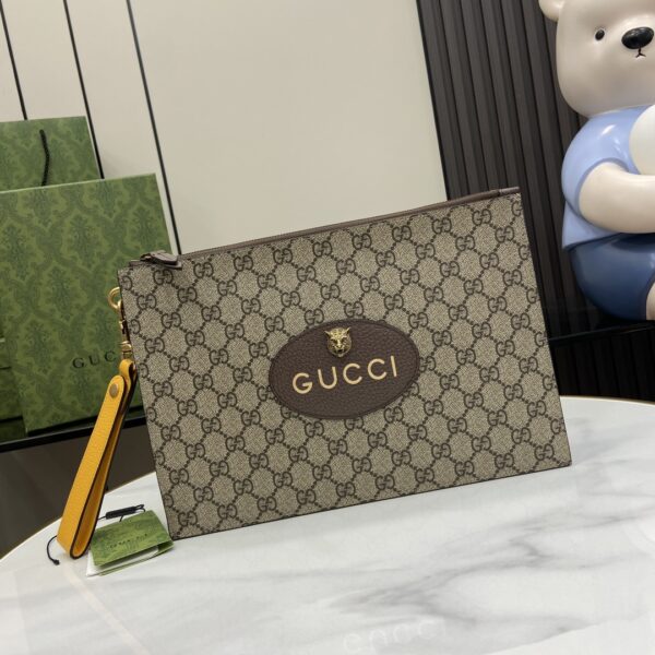 Gucci clutch with decorative strap Model number:473956. Size:30.5✖️21✖️1.5cm. Color: yellow brown/brown pvc.