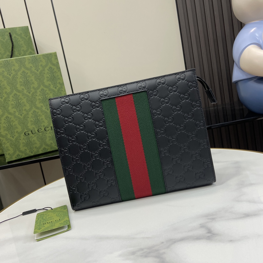 Gucci clutch with decorative strap Model:475316. Size:26✖️20✖️6cm. Color: Black/embossed G original leather.