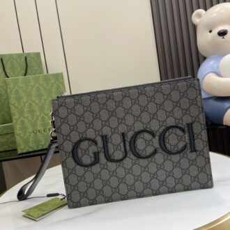 Gucci clutch with decorative strap Model:768374, Size: 22 (length) x 28 (width) x 3 cm (thickness) Color: Black/Gray PVC. Italian creation Weight: Approx. 0.4 kg
