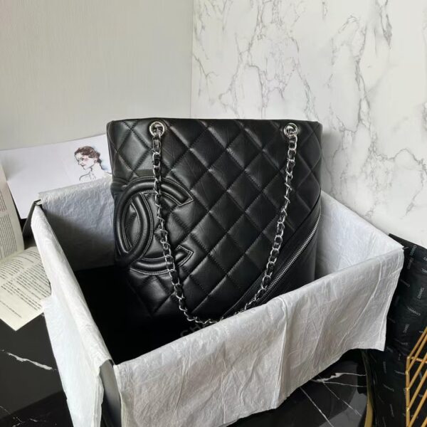 Chanel Cambon Basket Bag features a bold double-C logo Size: 25 × 28 × 12 cm Model: AS25168