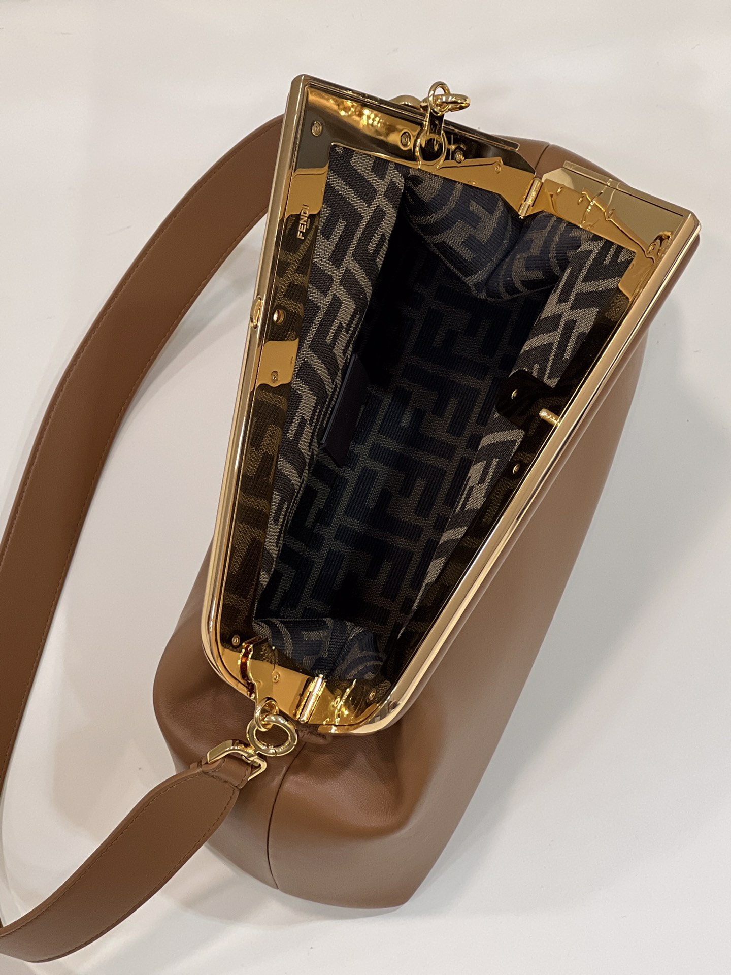 fendi❤️First series uses F as the letter as the design highlight and adopts an oblique frame outline. The appearance design is also unique and innovative. It is asymmetrical bag, fashionable and neat. It can not only be used as a handbag, but also a removable shoulder strap design can also be used as a shoulder bag. It is more perfect when holding, multifunctional, soft leather, and has a great feel. Many celebrities recommend one, worth having. Size 32.5x15x23.5cm Model number 80018L earthyellow - Image 8