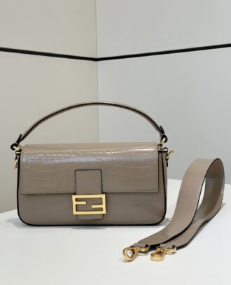Fendi Baguette's iconic medium handbag with flip design, exquisite black crocodile pattern material, paired with FF magnetic buckle closure, internal compartment, zipper bag and retro gold metal parts, the handbag has removable handles and shoulder straps for handheld, shoulder or crossbody Model 8628 Size 27x6x16