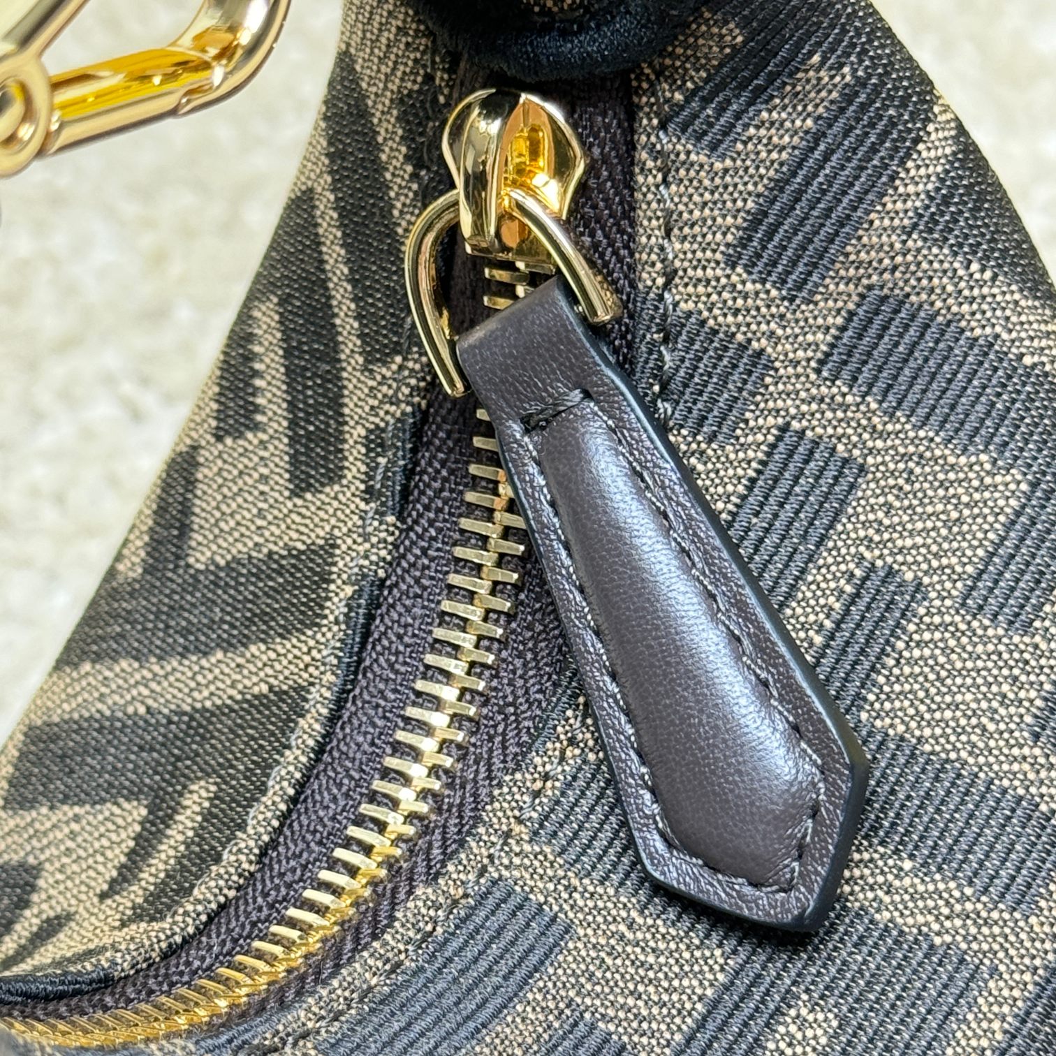 Fendography Nano version of crescent bag, zippered closure, decorated with FENDI retro gold metallic words. It is equipped with adjustable clamp straps, which can be hung on a large bag or worn on the wrist. With shoulder strap hook buckle. Classic FF jacquard fabric material. Brown napa leather details. Gold finish metal parts. Size: 16.5-14-5cm Model: 9933 Old Flower - Image 6