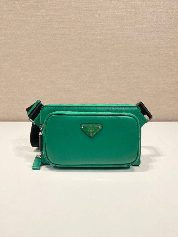 P home full leather chest bag 2VH156✨✨ This simple and versatile waist bag/breast bag uses imported cross patterns, presenting a modern charm of technological detail. Recycled nylon adjustable shoulder straps with top-grade metal buckles and external zippered pockets, small back pockets, and internal slit slots. Size: 21 x 13 x 2.5