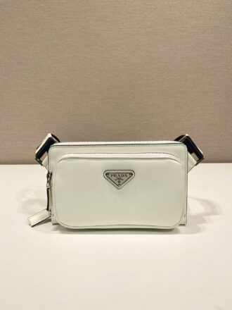 P home full leather chest bag 2VH156✨✨ This simple and versatile waist bag/breast bag uses imported cross patterns, presenting a modern charm of technological detail. Recycled nylon adjustable shoulder straps with top-grade metal buckles and external zippered pockets, small back pockets, and internal slit slots. Size: 21 x 13 x 2.5