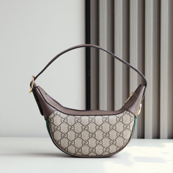 𝗚𝘂𝗰 𝗢𝗽𝗵𝗶𝗱𝗶𝗮 Mini! The classic retro style is definitely a rare model for this series that suits all ages. The Ophidia series continues to grow and grow, bringing amazing new products every season. This handbag is one of the Epilogue series and comes with removable shoulder straps. The square vintage styling blends the brand's classic striped webbing and double G styling accessories, and the handbag is made of the brand's iconic double G pattern. Model: 658551, Dimensions: 20 width, 15 side width 5cm